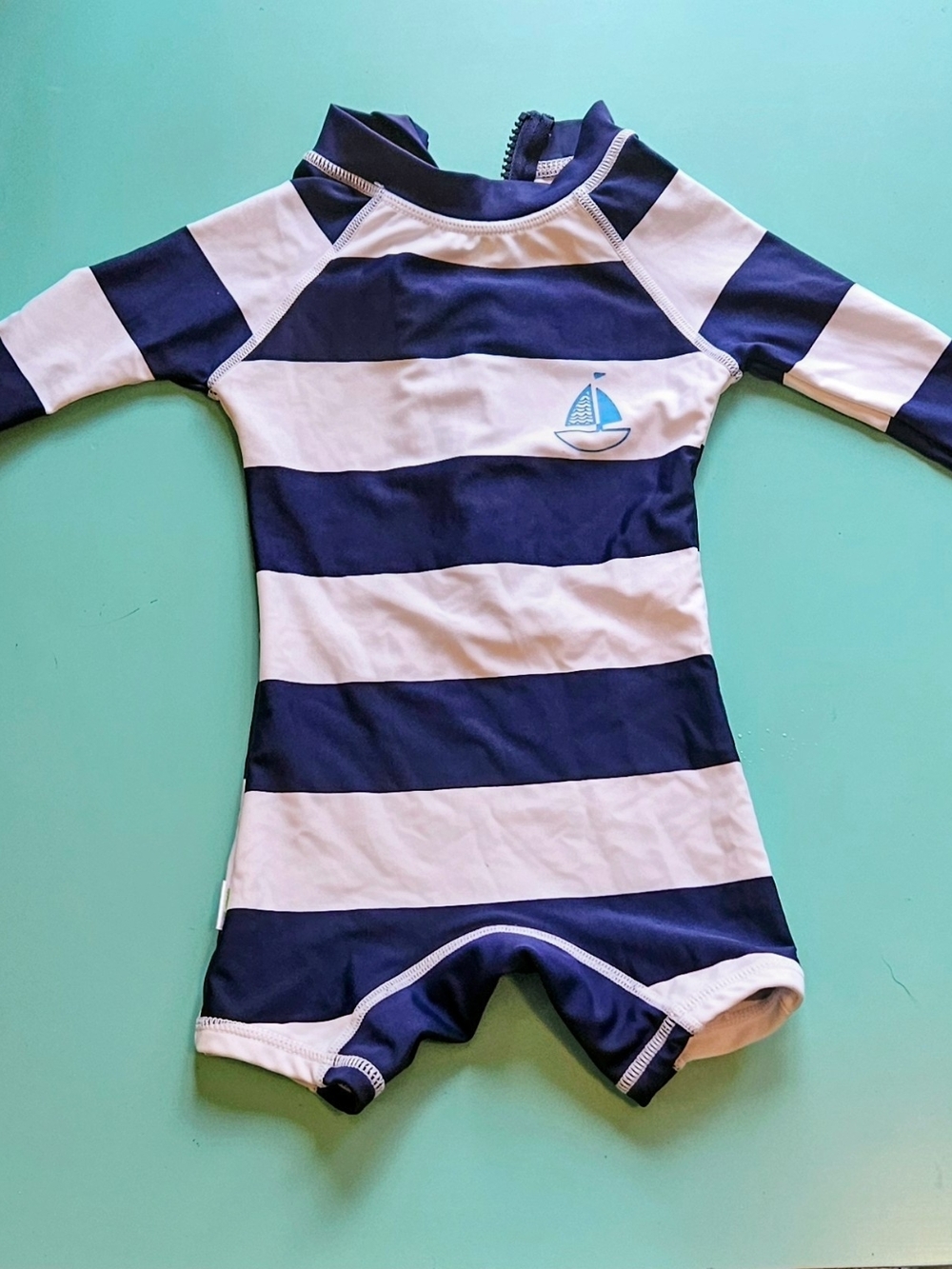 Navy & White Striped Baby Rashguard One-Piece with Sailboat
